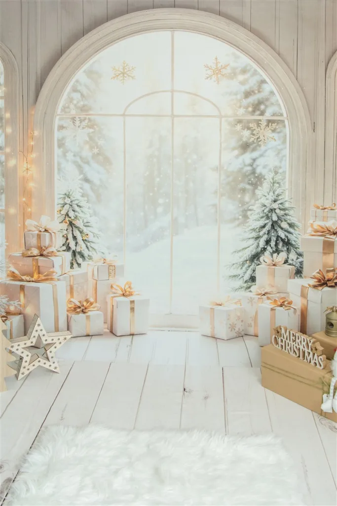 White elegant christmas set up with arched windows and snowy christmas trees